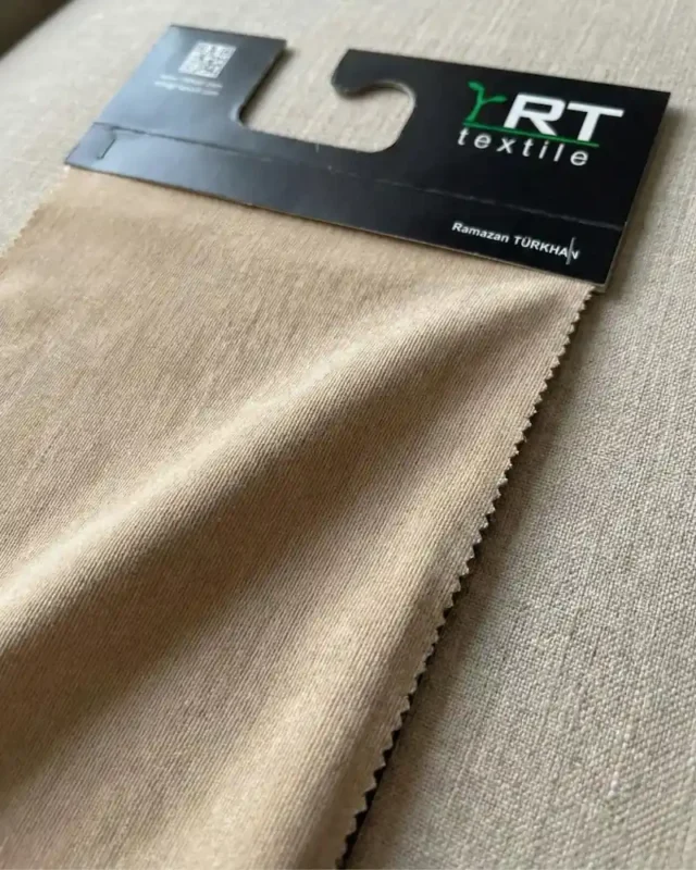 Knitted fabric material composition and traceability for sustainable knitted fabric sourcing
